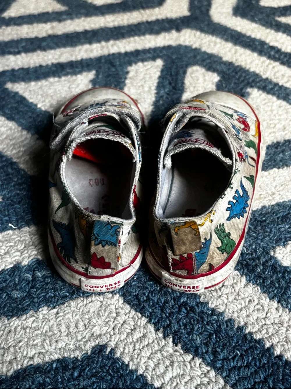 Converse Kids White Canvas Sneakers with Red, Blue, Green, Yellow Dinosaur Print